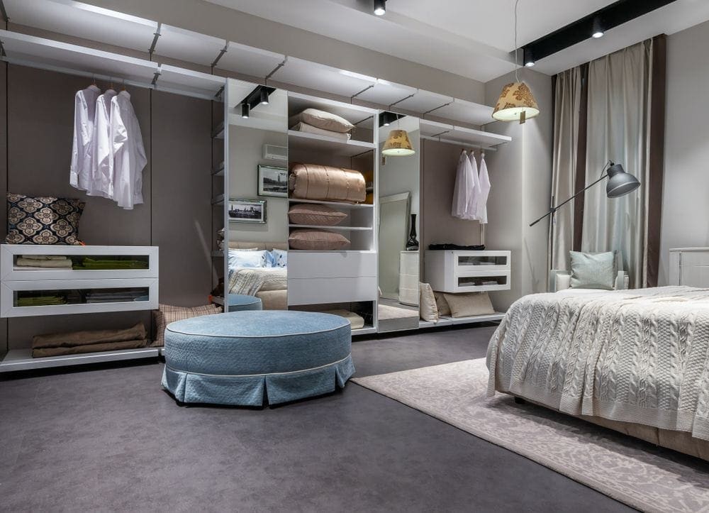 Calm bedroom with wardrobe and soft furnishings