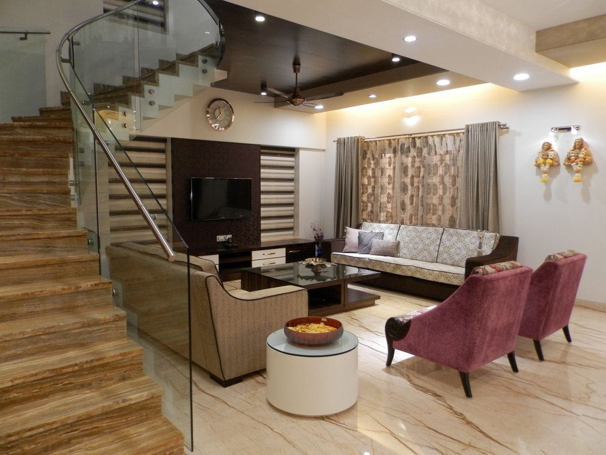 Staircase and living area of a spacious home